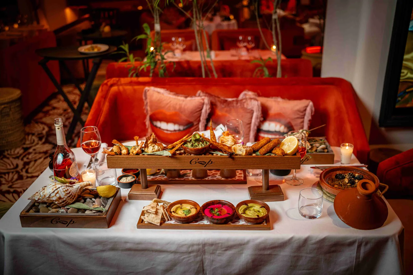 Coup de Foudre Agadir menu sharing platter with Moroccan tapas, seafood and Mediterranean dips